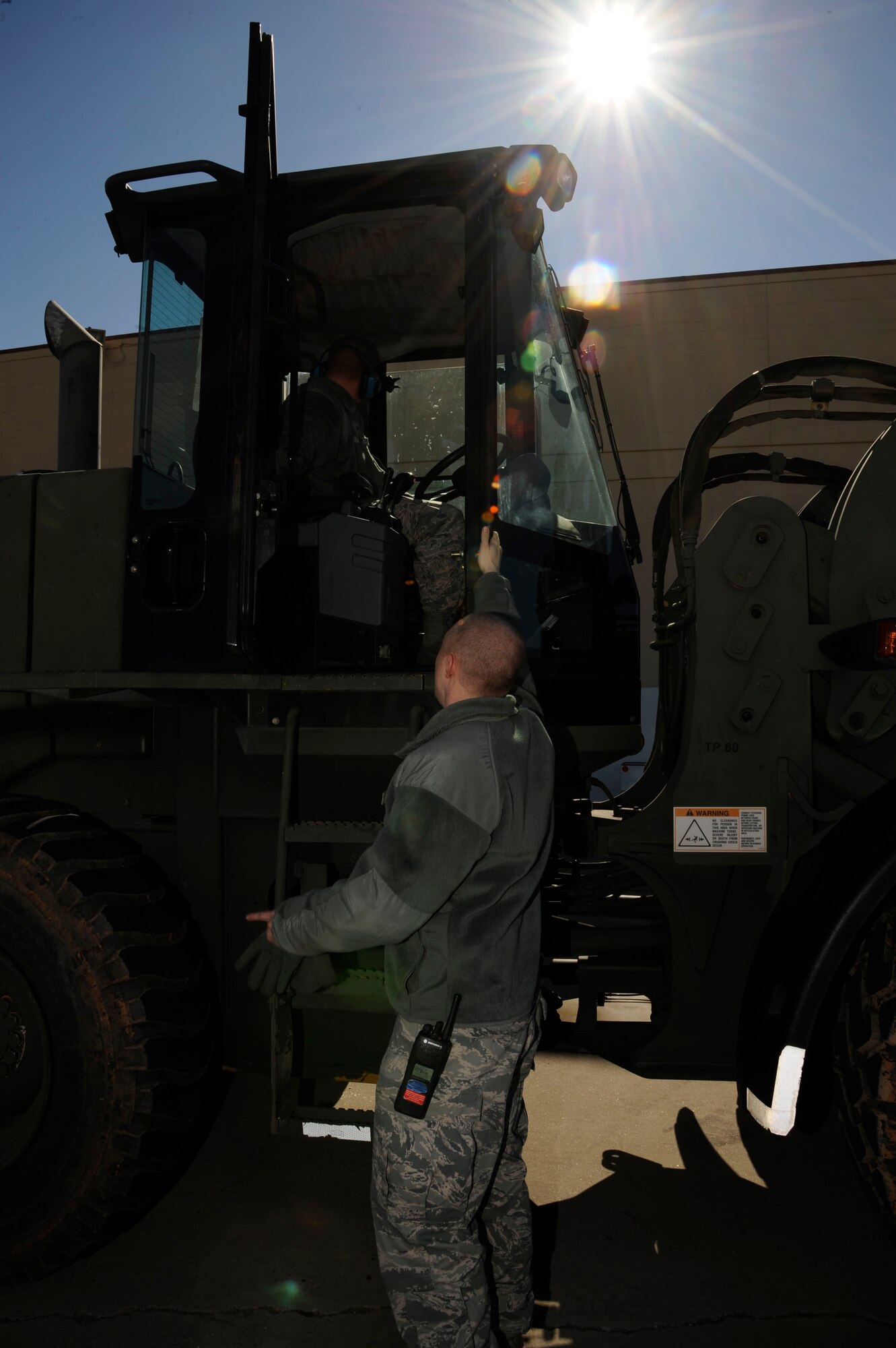 Senior Airman Jesse Bowers, 2nd Logistics Readiness Squadron Vehicle Operations, speaks with Senior Airman Richard Cram, 2 LRS Vehicle Ops, during the unloading of B-52H Stratofortress engine and body cowlings on Barksdale Air Force Base, La., Feb. 28. The cowlings will be shipped to Tinker Air Force Base, Okla., for depot level repairs. Depot level repairs are where components or aircraft parts require higher level maintenance and need more advanced equipment to help assess problems. (U.S. Air Force photo/Airman 1st Class Andrew Moua)