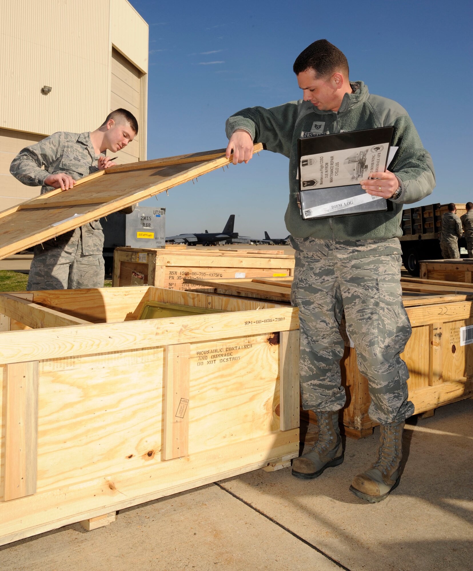 Airman 1st Class Frederick Ross, 2nd Logistics Readiness Squadron, and Staff Sgt. Alejandro Fernandez, 2nd Maintenance Squadron, inspect B-52H Stratofortress engine and body cowlings on Barksdale Air Force Base, La., Feb. 28. The inspection makes sure the proper pieces and parts are present for shipping to Tinker Air Force Base, Okla., for repairs. (U.S. Air Force photo/Airman 1st Class Andrew Moua)