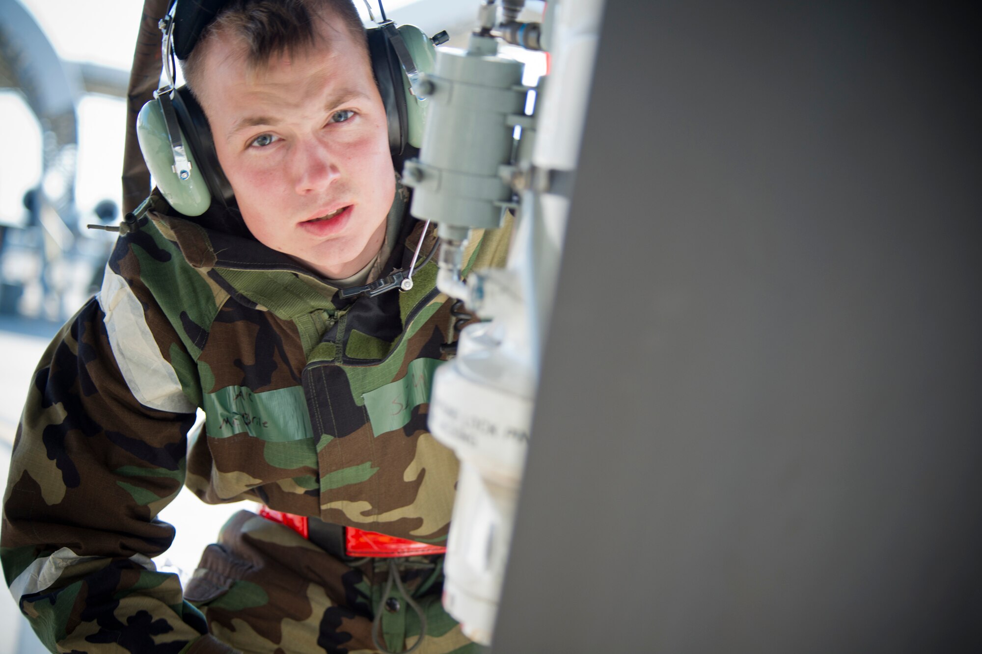 U.S. Air Force Airman 1st Class Kalib McBride, 23d Aircraft Maintenance Squadron crew chief, inspects the landing gear of an A-10C Thunderbolt II during a phase II operational readiness exercise Feb. 28, 2013, at Moody Air Force Base, Ga. McBride helped recover the aircraft and performed various post-flight inspections to maintain its serviceability. (U.S. Air Force photo by Staff Sgt. Jamal D. Sutter/Released)