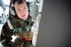 U.S. Air Force Airman 1st Class Kalib McBride, 23d Aircraft Maintenance Squadron crew chief, inspects the landing gear of an A-10C Thunderbolt II during a phase II operational readiness exercise Feb. 28, 2013, at Moody Air Force Base, Ga. McBride helped recover the aircraft and performed various post-flight inspections to maintain its serviceability. (U.S. Air Force photo by Staff Sgt. Jamal D. Sutter/Released)