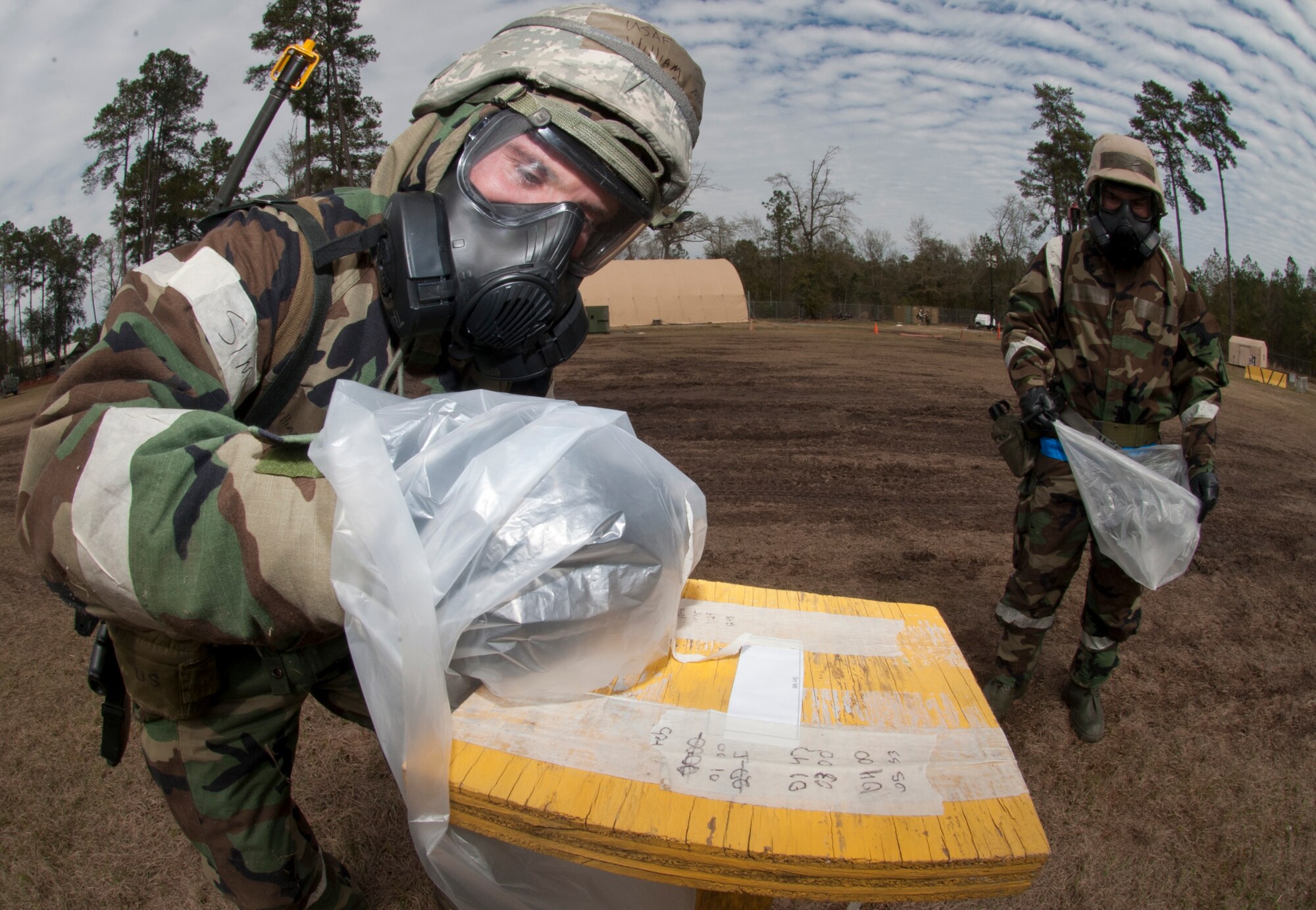 U.S. Air Force Senior Airman William McCann, 23d Civil Engineer Squadron post-attack reconnaissance team member, checks for contamination during a phase II operational readiness exercise Feb. 27, 2013, at Moody Air Force Base, Ga. Airmen participating in the exercise went through different scenarios and were evaluated on how successful and accurate they completed tasks. (U.S. Air Force Photo by Airman Paul Francis/Released)
