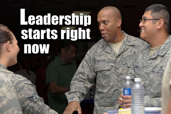 Col. Alvis Headen, 23rd Medical Group commander, speaks with Airmen at Moody Air Force Base, Ga. Development of all Airmen begins with leadership at all levels.  Air Force Graphic by Felicia M. Hall