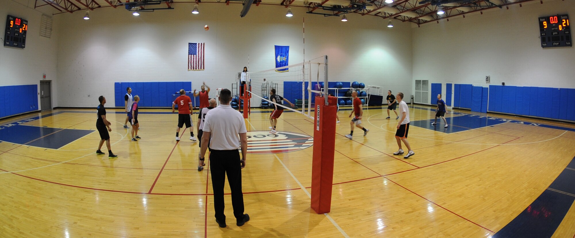 WHITEMAN AIR FORCE BASE, Mo. – Orlando Diaz, Civil Engineer-A team member, prepares to spike the volleyball, Feb. 25. CE-A faced off against the Operations Support Squadron in each team’s first match of the year, and won the match, 2-0. (U.S. Air Force photo Airman 1st Class Bryan Crane)(Released)