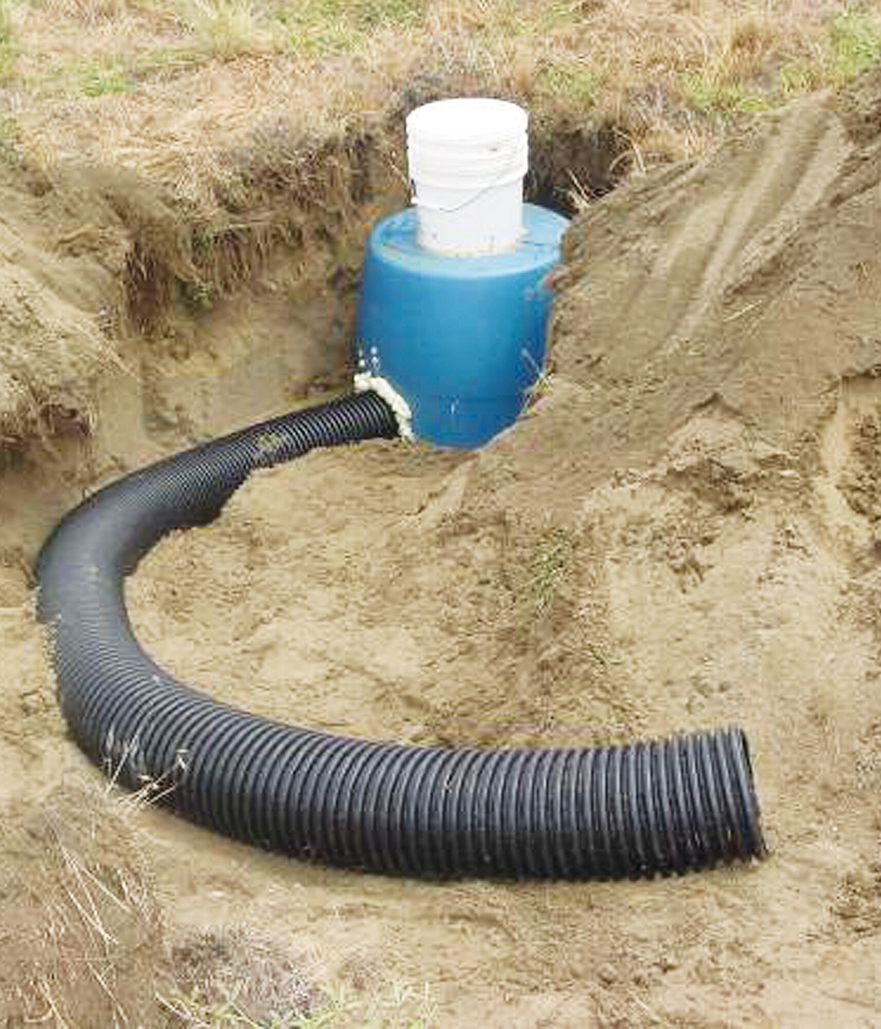 The Kirtland AFB Environmental section, with support from Chugach Management Services, built artificial burrows for the base's burrowing owl population. 