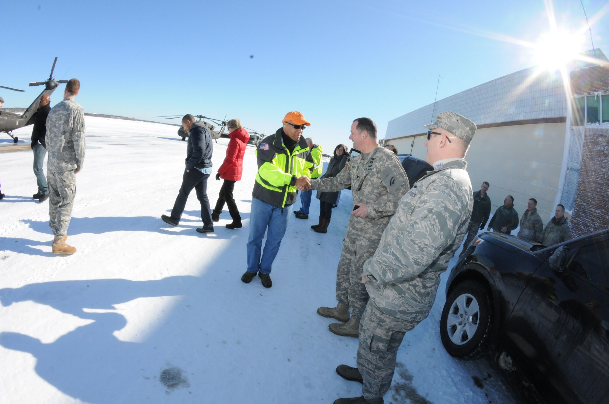 Governor Duval Patrick visits the Sandwich Emergency Operations center the day after Winter Storm Nemo hit the area, 9 February. The governor is seen here greeting Massachusetts National Guard members while he waits for his flight back to Boston by the Army Aviation command on Camp Edwards. (National Guard photo by Tech. Sgt. Kerri Cole/Released)