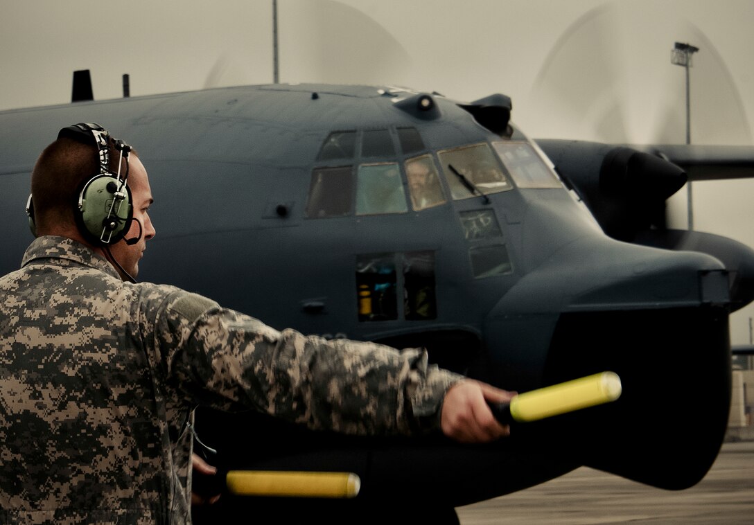 Master Sgt. Robert Hoeft, of the 919th Aircraft Maintenance Squadron, marshals out an MC-130E Combat Talon I at Duke Field, Fla.  There are only five Talons left at the special operations reserve base.  The 919th has begun remissioning to the Aviation Foreign Internal Defense aircraft, the C-145 Skytruck.  (U.S. Air Force photo/Tech. Sgt. Samuel King Jr.)