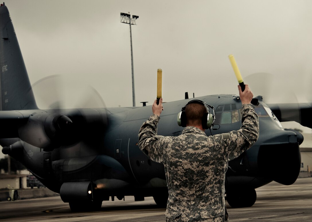 Master Sgt. Robert Hoeft, of the 919th Aircraft Maintenance Squadron, marshals out an MC-130E Combat Talon I at Duke Field, Fla.  There are only five Talons left at the special operations reserve base.  The 919th has begun remissioning to the Aviation Foreign Internal Defense aircraft, the C-145 Skytruck.  (U.S. Air Force photo/Tech. Sgt. Samuel King Jr.)