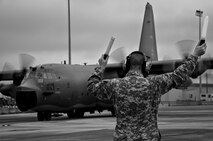 Master Sgt. Robert Hoeft, of the 919th Aircraft Maintenance Squadron, marshals out an MC-130E Combat Talon I at Duke Field, Fla.  There are only five Talons left at the special operations reserve base.  The 919th has begun remissioning to the Aviation Foreign Internal Defense aircraft, the C-145 Skytruck.  (U.S. Air Force photo/Tech. Sgt. Samuel King Jr.)