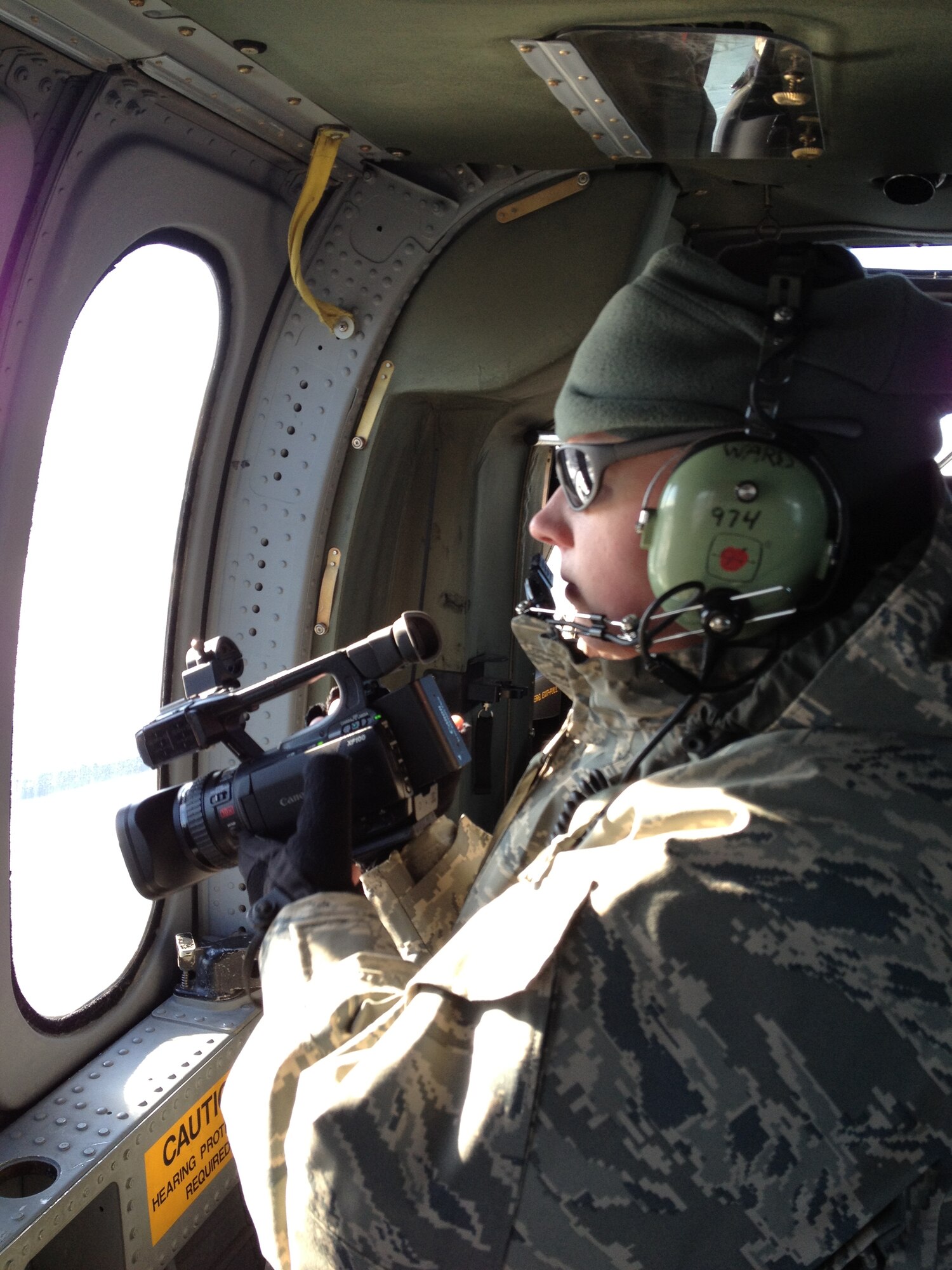 Tech. Sgt. Kerri Cole, 102nd Public Affairs, gathers aerial footage of damages that occurred on Cape Cod after Winter Storm Nemo hit the area 8 and 9 February. The footage provides incident commanders near-real time access to the best available still and video imagery which helps Department of Defense and civilian authorities during critical incidents or contingencies. (National Guard photo by Senior Master Sgt. Jeffrey Booker/Released)