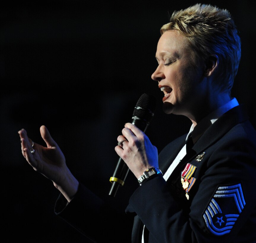 Chief Master Sgt. Angela Burns, U.S. Air Force Band Singing Sergeants flight chief, performs at the Daughters of the American Revolution Constiution Hall in Washington, D.C., Feb. 24, 2013.  The Band performed with The Rouges, a Celtic rock band during their Guest Artist Series concert. (U.S. Air Force photo/ Airman 1st Class Nesha Humes)(Released)