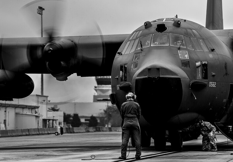 Master Sgt. Robert Hoeft, of the 919th Aircraft Maintenance Squadron, inspects the tire of an MC-130E Combat Talon I while Senior Airman Rebecca Stinson, a loadmaster with the 711th Special Operations Squadron, speaks with the aircrew during preflight procedures prior to a sortie at Duke Field, Fla.  There are only five Talons left at the special operations reserve base.  The 919th has begun remissioning to the Aviation Foreign Internal Defense aircraft, the C-145 Skytruck.  (U.S. Air Force photo/Tech. Sgt. Samuel King Jr.)