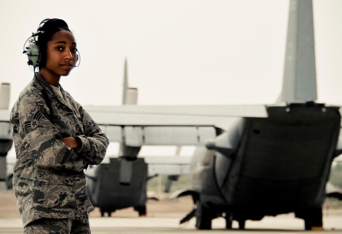 Senior Airman Alyson Hill, of the 919th Aircraft Maintenance Squadron, waits to begin preflight procedures on an MC-130E Combat Talon I at Duke Field, Fla.  There are only five Talons left at the special operations reserve base.  The 919th has begun remissioning to the Aviation Foreign Internal Defense aircraft, the C-145 Skytruck.  (U.S. Air Force photo/Tech. Sgt. Samuel King Jr.)