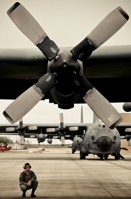 A senior airman with the 919th Aircraft Maintenance Squadron waits to begin preflight procedures on an MC-130E Combat Talon I at Duke Field, Fla.  There are only five Talons left at the special operations reserve base.  The 919th has begun remissioning to the Aviation Foreign Internal Defense aircraft, the C-145 Skytruck.  (U.S. Air Force photo/Tech. Sgt. Samuel King Jr.)