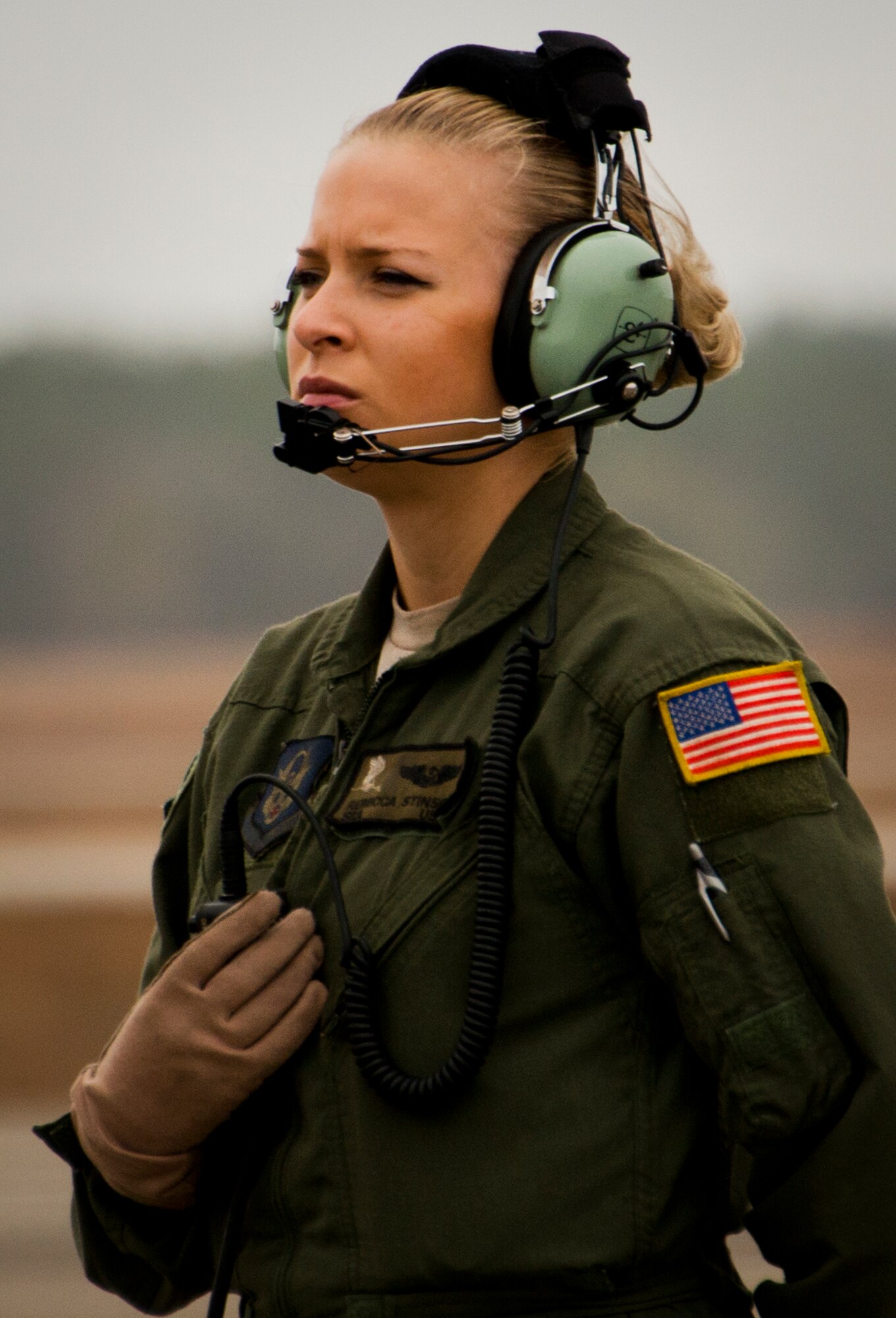 Senior Airman Rebecca Stinson, a loadmaster with the 711th Special Operations Squadron, talks with the aircrew during preflight checks before an MC-130E Combat Talon I sortie at Duke Field, Fla.  There are only five Talons left at the special operations reserve base.  The 919th has begun remissioning to the Aviation Foreign Internal Defense aircraft, the C-145 Skytruck.  (U.S. Air Force photo/Tech. Sgt. Samuel King Jr.)