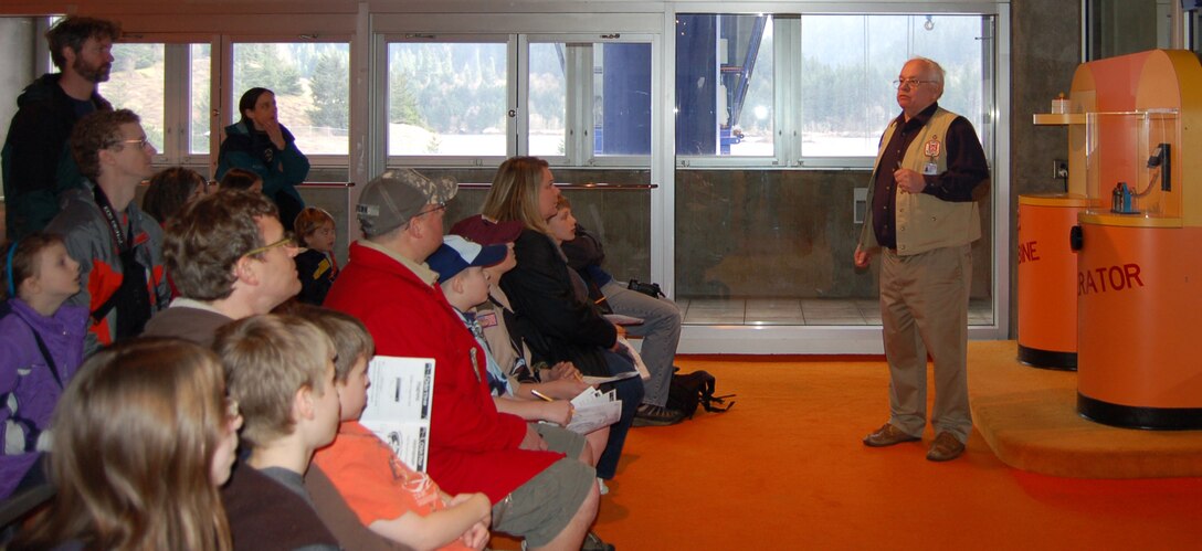 Volunteer Jim Price outlines information to a crowd at the Great Electrifying Event at Bonneville Lock and Dam, which was held on Feb. 23, 2013.