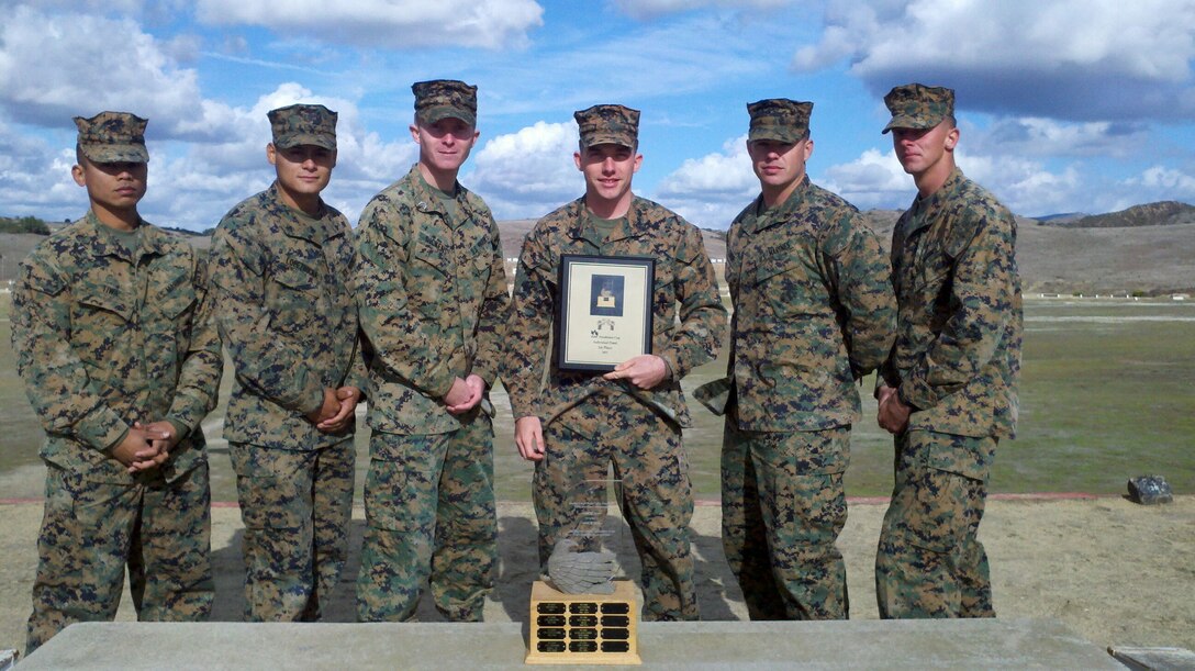 3AABN Marine takes 1st place overall in the pistol at the base Intramural Matches. Cpl Arpin took first place overall in the pistol, shooting from the 25 yd line one handed. The Marines from L-R are: Sgt Tiwa, LCpl Lopezrocha, Sgt Dickens, Cpl Arpin, Cpl Simon and Cpl Grebe.
