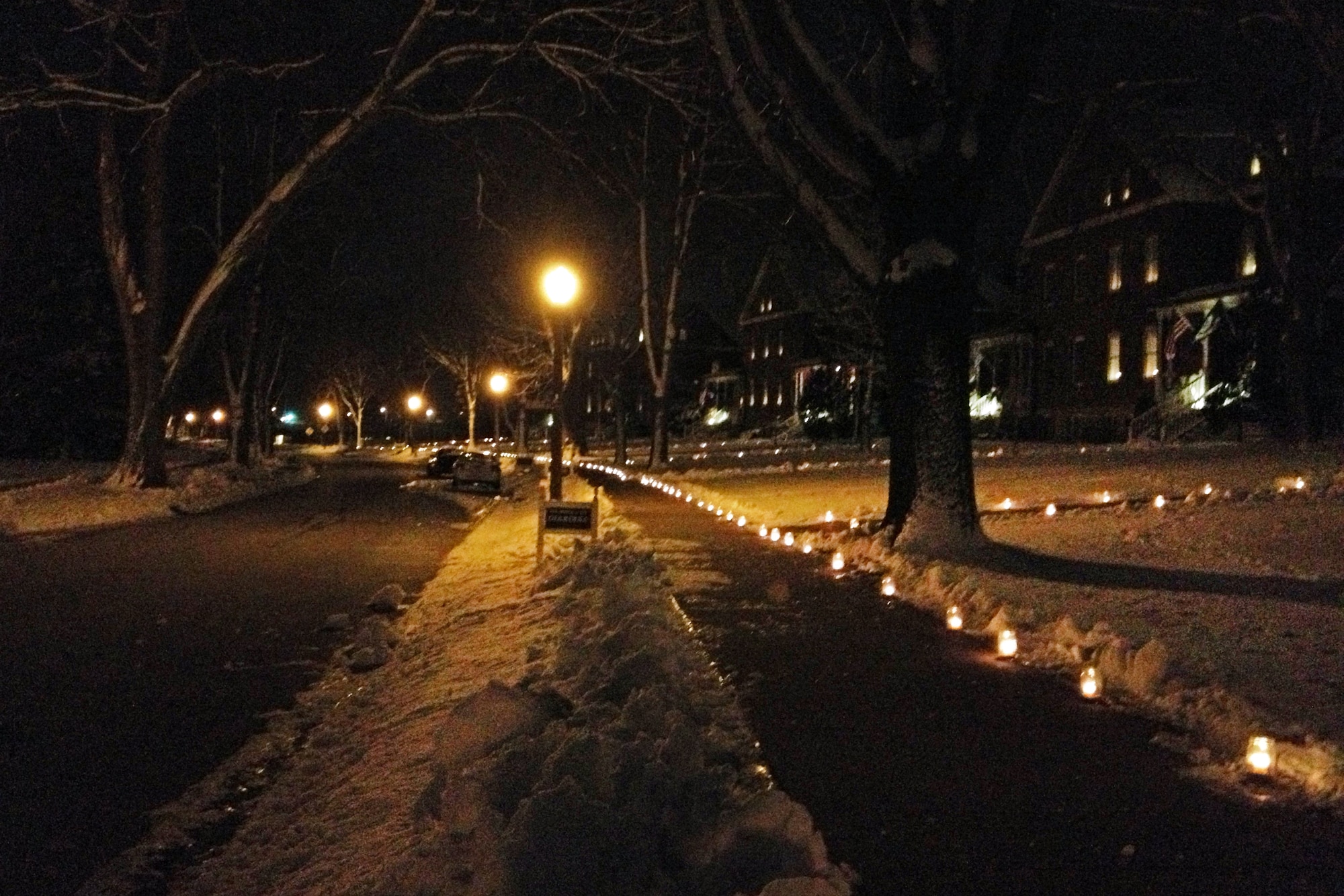 General's Row, which is comprised of homes built in the late 1800s, is lined with hundreds of candles Dec. 24 at Offutt Air Force Base, Neb. This long-time tradition, known as the luminaries, happens just once or twice a year along the row.