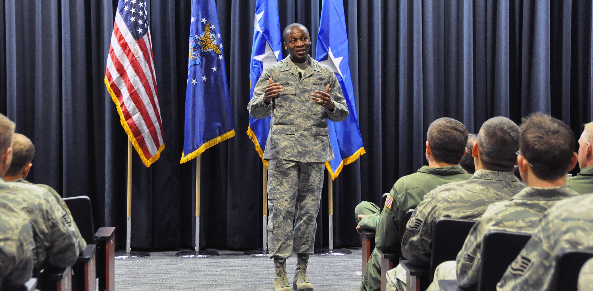 PETERSON AIR FORCE BASE, Colo. – Lt. Gen. Darren McDew, 18th Air Force commander, addresses Airmen of the 302nd Airlift Wing here during an all call Dec. 19. During his remarks, the general emphasized two important issues the Air Force is facing: sexual assault and the importance of being a good Wingman. McDew also challenged Airmen to be bold, innovative risk takers. The general spent two days with the Air Force Reserve Command’s 302nd AW to observe first-hand the Total Force Integration initiative between the wing and the active duty 52nd Airlift Squadron. (U.S. Air Force photo/Tech. Sgt. Daniel Butterfield)