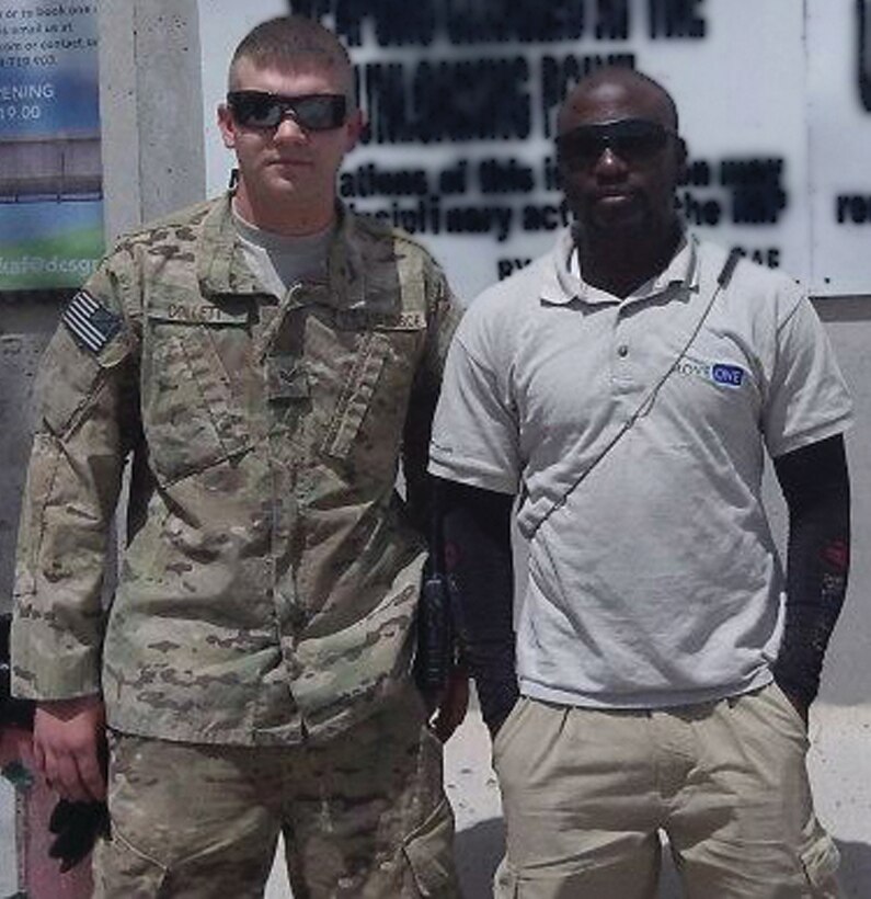 WRIGHT-PATTERSON AIR FORCE BASE, Ohio - Senior Airman Nathan Collett, 87th Aerial Port Squadron air transportation apprentice, used his self aid and buddy care training to save this man while deployed to Afghanistan in May 2012. (Courtesy photo)