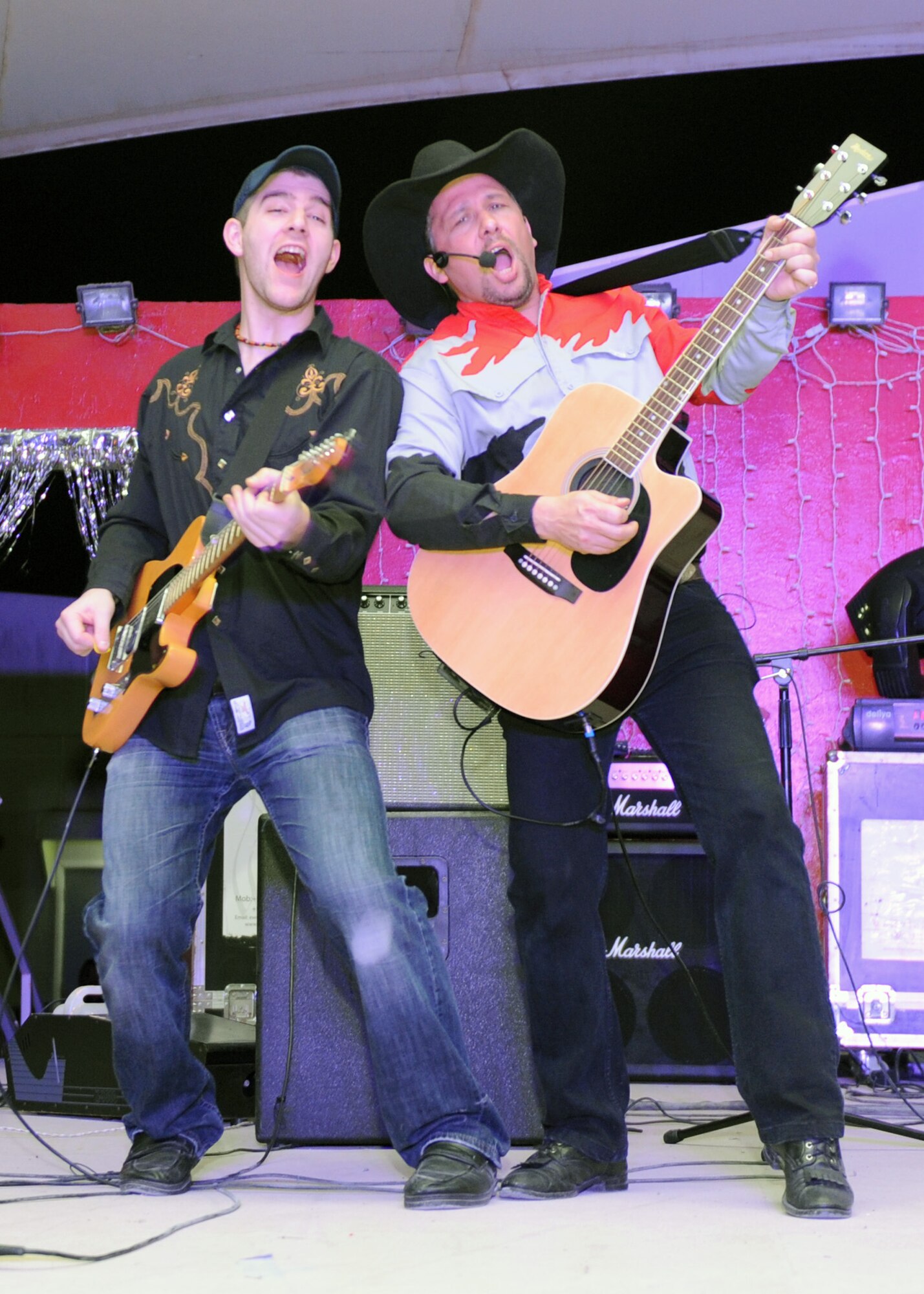 SOUTHWEST ASIA – A Garth Brooks cover band performed for U.S. and coalition forces at a New Year’s Eve celebration here. Other cover bands featured music by Katie Perry, Lady Gaga and Bon Jovi. (U.S. Air Force photo/Senior Airman Joel Mease)