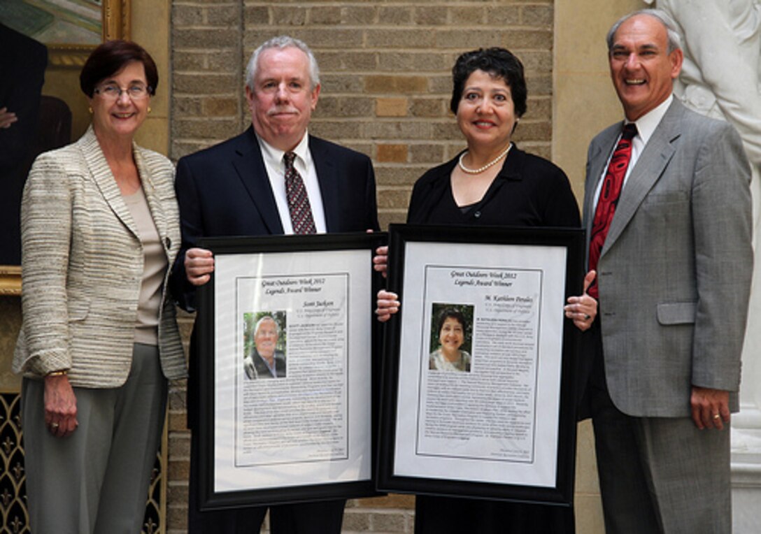 Dr. Kathleen Perales and Scott Jackson, ERDC Environmental Laboratory, received the 2012 Legends Award by the American Recreation Coalition. Pictured from left to right are Mary Coulombe, chief of Natural Resources Management, U.S. Army Corps of Engineers; Jackson, Perales and Derrick Crandall, president of the American Recreation Coalition.