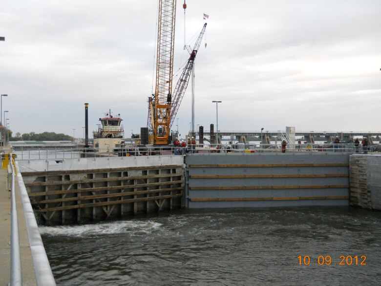 An old gate is mitered with a new gate following it's successful installation by the Mississippi River Project Structures Maintenance Unit at Lock and Dam 20 in October.