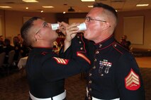 Marine Wing Support Squadron 471 I&I staff celebrate their mess night July 20.