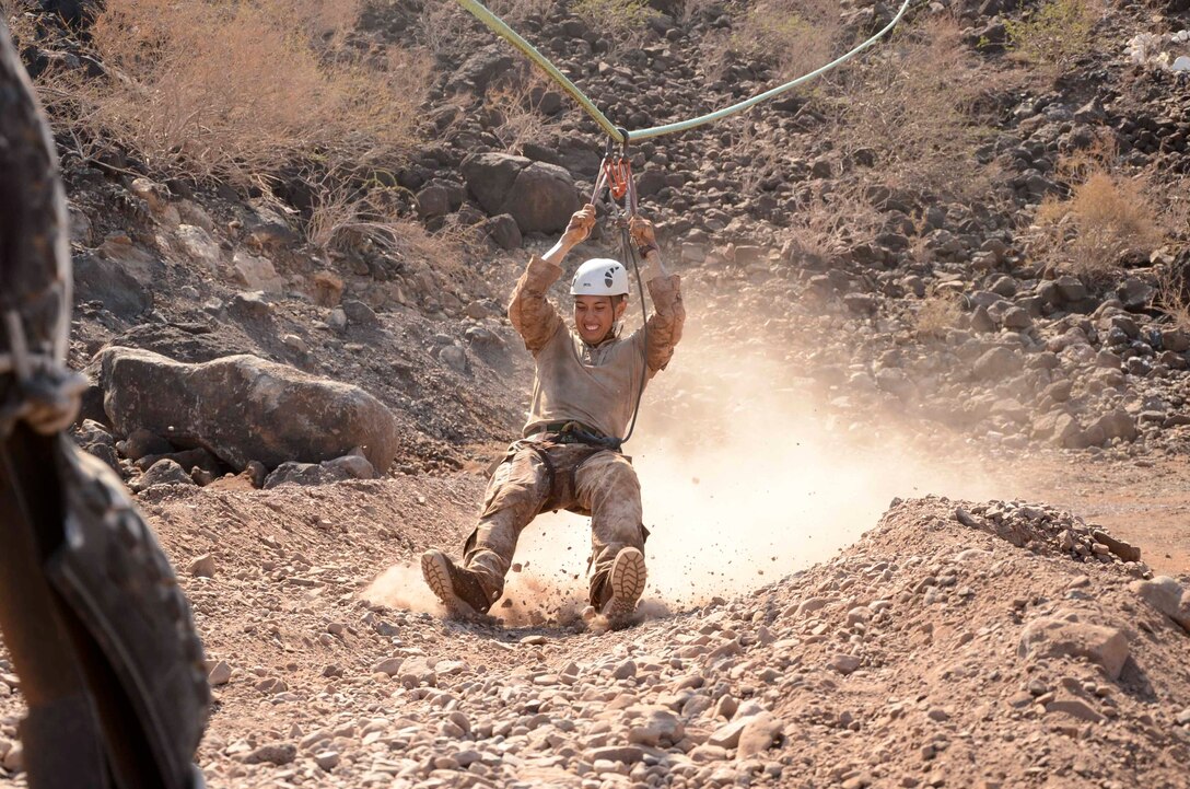 A Marine assigned to the 15th Marine Expeditionary Unit (MEU) negotiates a zipline during an obstacle course at Arta Beach, Djibouti, Dec. 11. 15th MEU is deployed as part of the Peleliu Amphibious Ready Group as a U.S. Central Command theater reserve force, providing support for maritime security operations and theater security cooperation efforts in the U.S. 5th Fleet area of responsibility. (U.S. Marine Corps photo by Cpl. Richard Sanglap-Heramis/Released)
