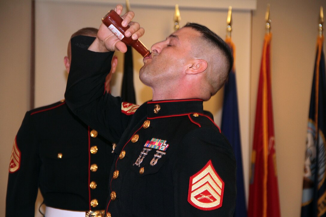 Marine Wing Support Squadron 471 I&I staff celebrate their mess night July 20.