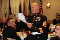 Marine Wing Support Squadron 471 I&I staff celebrate their mess night July 20. 