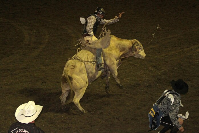 Cowboys perform at the 58th Annual Buffalo Championship Rodeo on June 23. The three-day event featured calf-roping, barrel racing and bull riding.