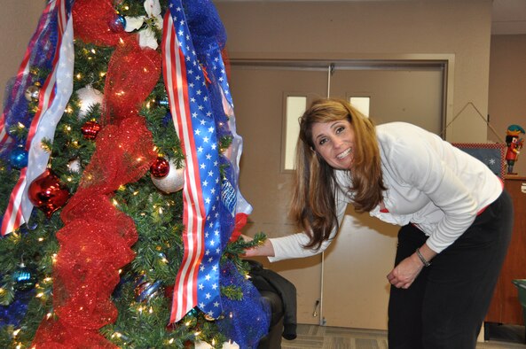 Members of the Moreno Valley Military Affairs Committee (MAC) decorate the 729th Airlift Squadron's crew lounge for the commander's holiday party held in December. 
(U.S. Air Force photo by Megan Crusher)
