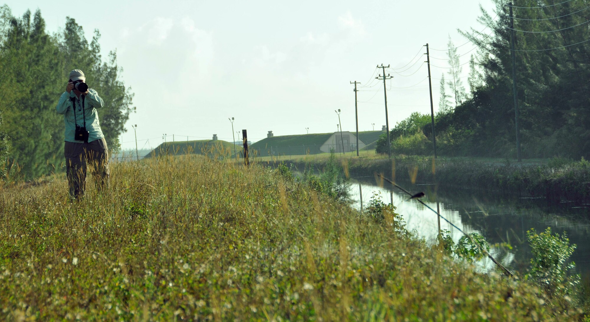 Bonnie Ponwith attempts to photograph a bird during the 2012 Christmas Bird Count at Homestead Air Reserve Base, Fla., Dec. 9. As a National Audubon society program, the Christmas Bird Count is an annual event, more than a century old, that takes place across the country, where tens of thousands of volunteers, students, scientists, and bird enthusiasts turn their heads to the sky in the name of conservation. Audubon and other organizations use data collected in this wildlife census to assess the health of bird populations and to help guide conservation action. (U.S. Air Force photo/Senior Airman Jacob Jimenez)