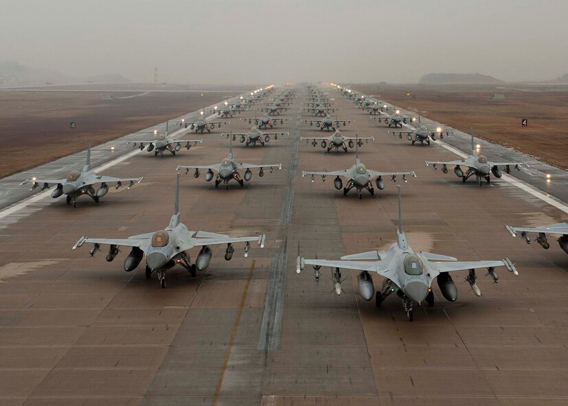 F-16 Fighting Falcons demonstrate an 'Elephant Walk' as they taxi down the flightline at Kunsan Air Base, South Korea, Dec. 14, 2012. The Elephant Walk was a demonstration of U.S. and South Korean air force capabilities and strength. The F-16 Fighting Falcons are from the 35th and 80th Fighter Squadrons of the 8th Fighter Wing, Kunsan AB, South Korea; the 4th Fighter Squadron of the 388th Expeditionary Fighter Wing at Hill Air Force Base, Utah; and the 38th Fighter Group of the Republic of Korea air force. (U.S. Air Force photo/Staff Sgt. Jonathan Fowler)