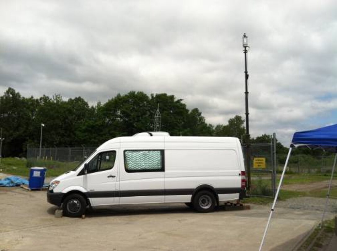 The Mobile Electro-Optical Laboratory with mast-mounted LiDAR for field remote-sensing campaigns.