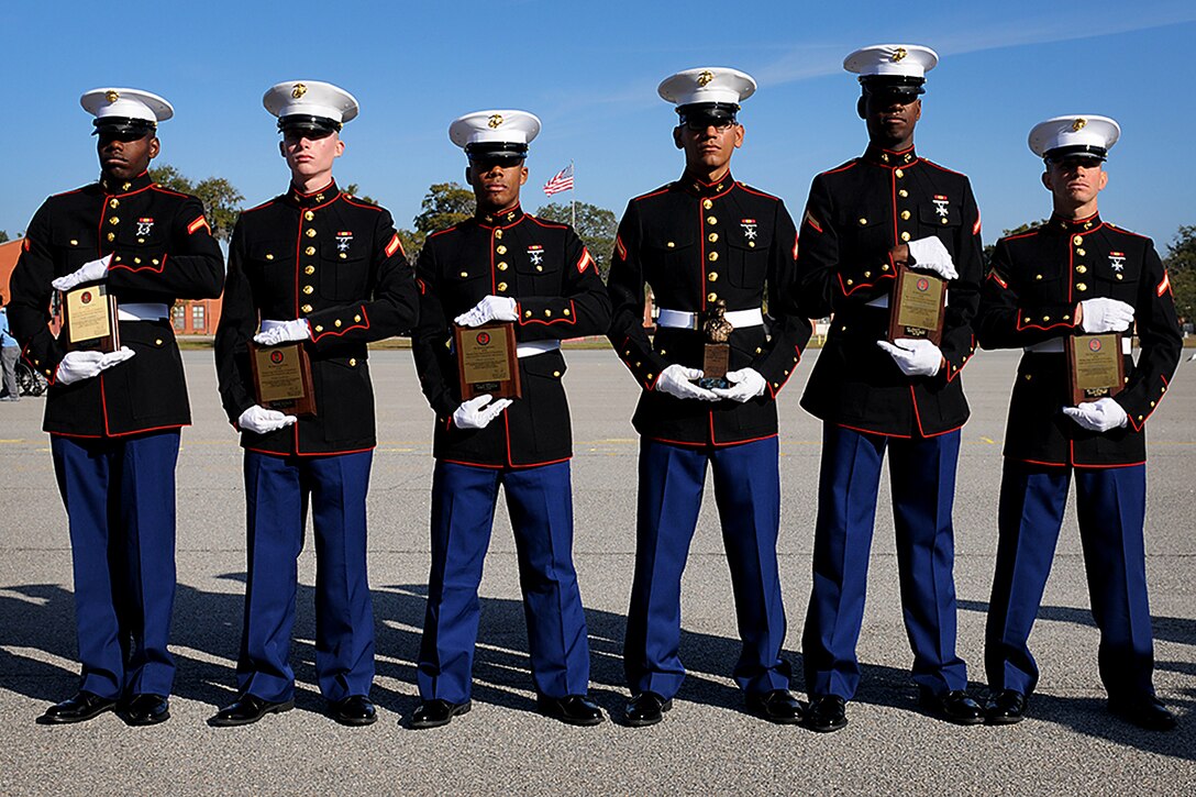 From left to right, Pfc. Heath Crouch from Tampa, Fla., Pfc. Brandon Noll from Fleetwood, Pa., Pfc. Jay Asencio from Miami, Fla., Pfc. Jose Carrillo from Orlando, Fla., Pfc. Cameron Pigott from West Palm Beach, Fla., and Pfc. Nicholas Villegas from Geneva, Fla., stand side by side after graduation aboard Parris Island, S.C., Jan. 4, 2013. Not only were five out of the six from Sixth Marine Corps District, but all five were also from Florida. (U.S. Marine Corps photo by Pfc. John-Paul Imbody)