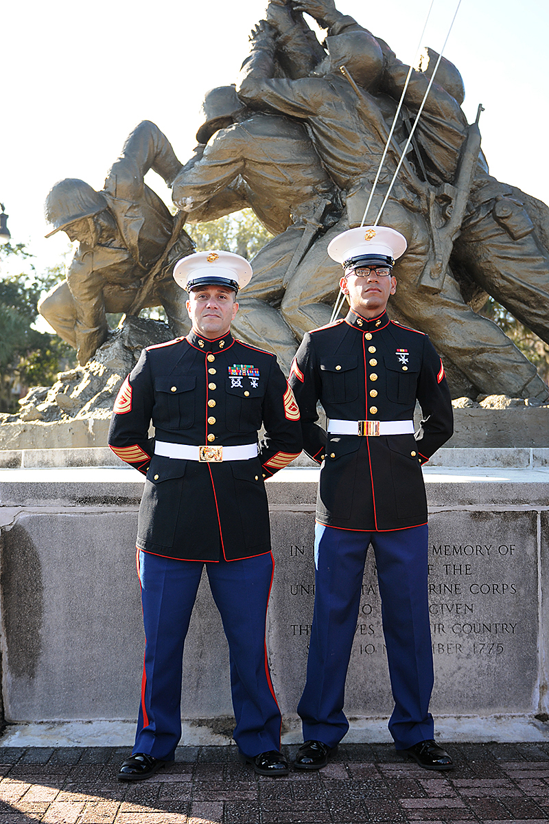 Private First Class Jose Carrillo, honor graduate of platoon 2004, posses with Gunnery Sgt. Reynaldo Aviles, the Staff Non-Commissioned Officer in charge of Recruiting Sub Station Fort Lauderdale, Fla., in front of the Iwo Jima Memorial aboard Parris Island, S.C., Jan. 4, 2013. Carrillo, an Orlando, Fla., native was not only the honor graduate of platoon 2004, but he was also company honor graduate for Golf Company.  (U.S. Marine Corps photo by Pfc. John-Paul Imbody)