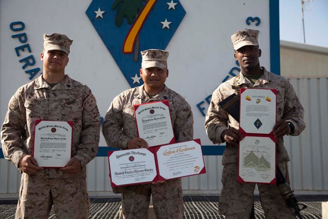 RCT-7 HQ Company Promotes Four and Reenlists One