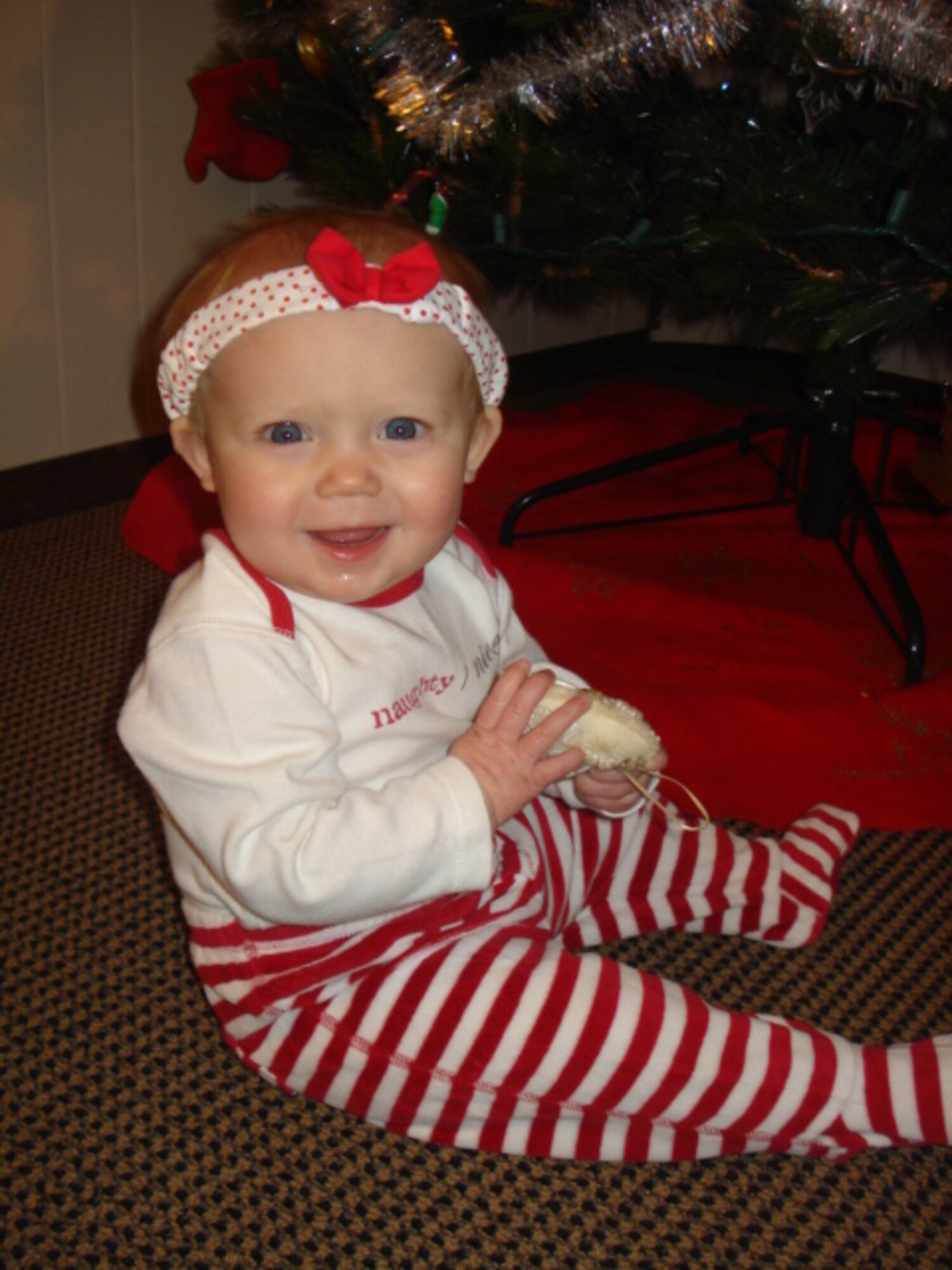 Emily Stephenson, daughter of Staff Sgt. Wayne Stephenson, of the 55th Intelligence Support Squadron, smiles at the camera. Emily was diagnosed with a genetic blood disorder that requires monthly blood transfusions.