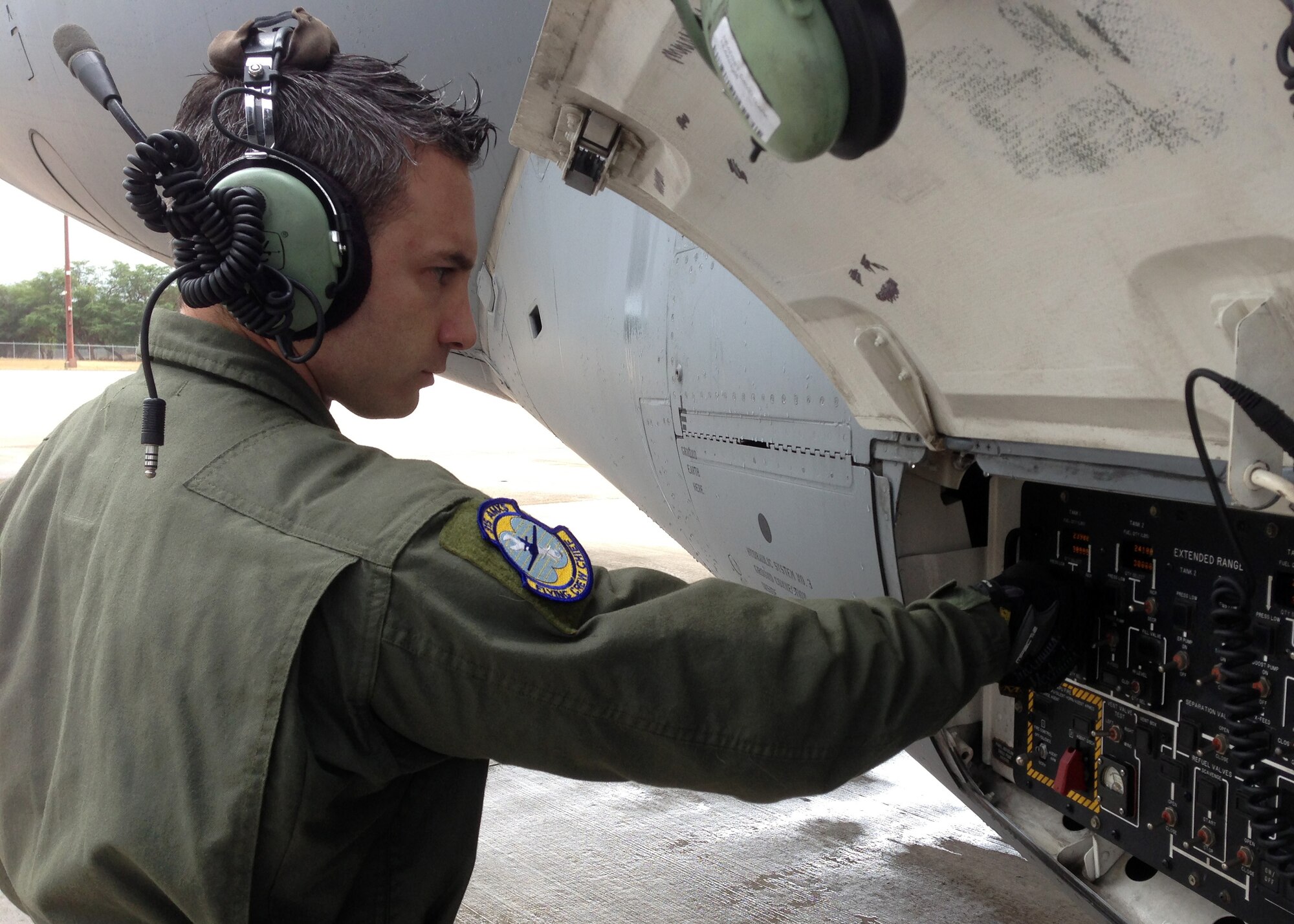 Tech. Sgt. Mark Graveline, 315th Aircraft Maintenance Squadron flying crew chief, performs an operational check on a C-17 Globemaster III aircraft fuel control panel Jan. 1, 2012 at Joint Base Pearl Harbor-Hickam, Hawaii. Flying Crew Chiefs are specially trained maintenance personnel who attend a six-week maintenance special operations course in addition to the hundreds of hours of training it takes to become seven-level aircraft maintainer.  (U.S. Air Force Photo/Lt. Col. Bill Walsh)