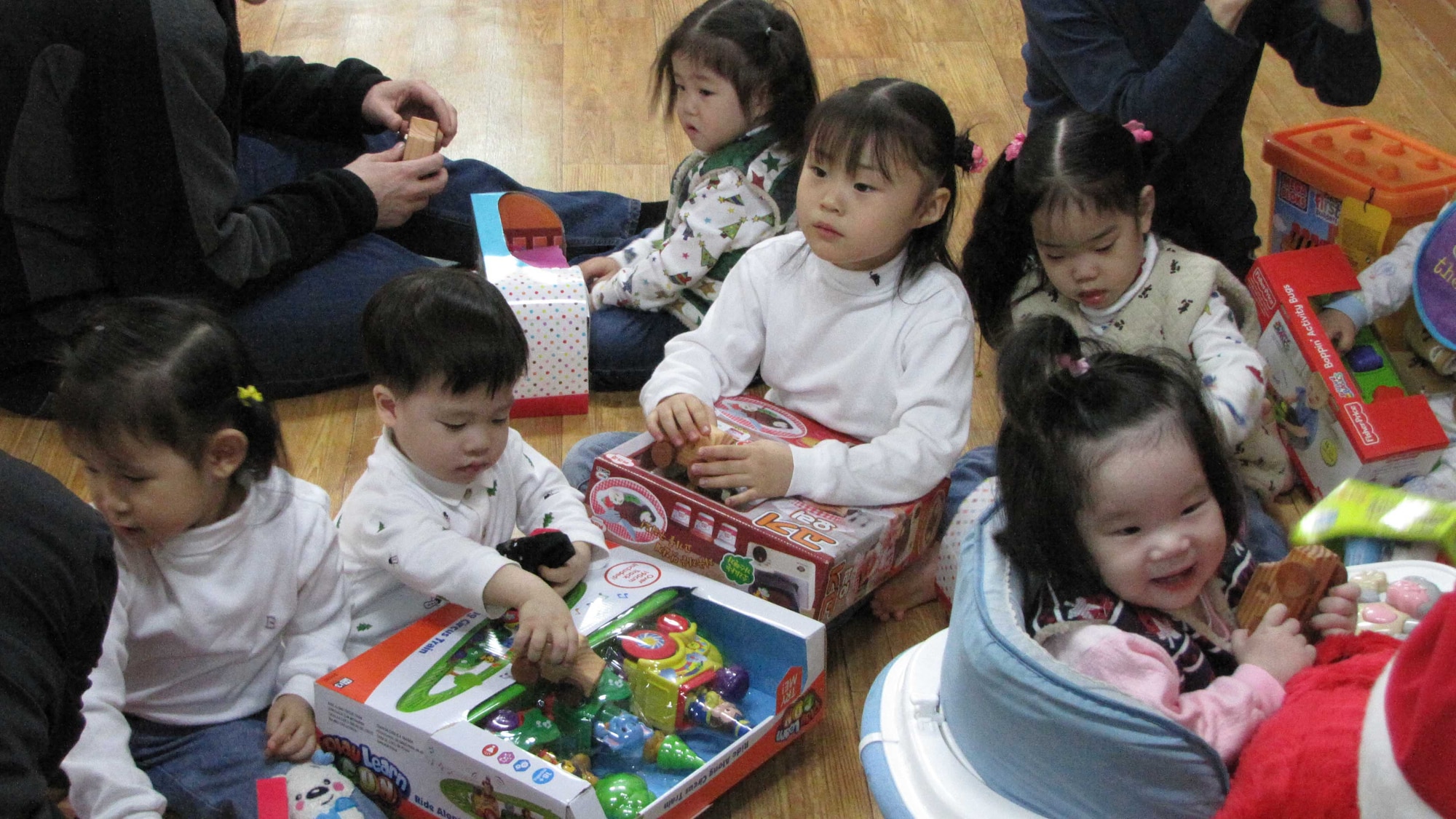 Children from the Chechon Children's Home in South Korea are elated to receive gifts from members of the Air Force Technical Applications Center's Detachment 452 based in Wonju, S. Korea.  Detachment personnel collected donations, including hand-carved toy cars from Ed Wares, father of Sabrina Miller, AFTAC's Scientific & Technical Information Program Manager.  The orphanage welcomes donations to improve the quality of life for the children and help offset costs for things like life skills seminars for young adults when they transition from the orphanage into Korean society. (Courtesy photo)
(Courtesy photo)
