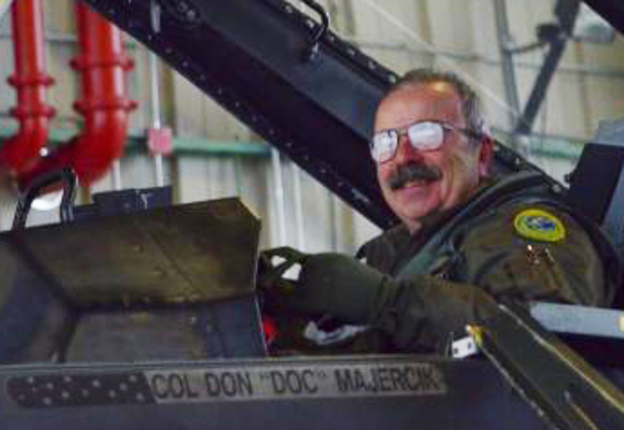 Col. Donald Majercik, state flight surgeon with the Vermont Air National Guard, surpassed 1,000 hours of flying time in the F-16 Fighting Falcon at the Burlington International Airport, South Burlington, Vt., Nov. 29, 2012. Majercik has served with the Vermont Air National Guard for more than 40 years. (U.S. Air Force photo/Staff Sgt. Sarah Mattison) 