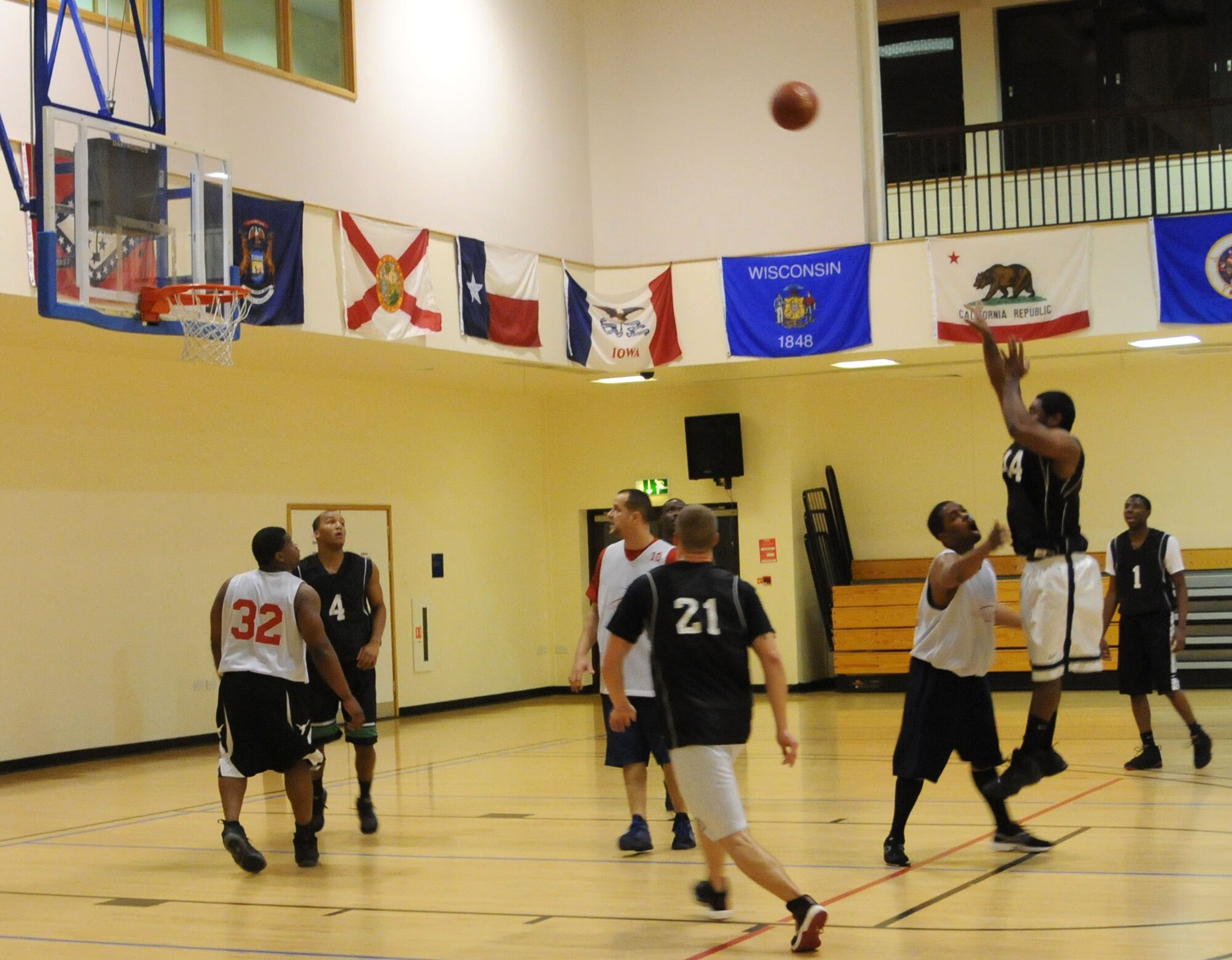 Staff Sgt. Damien Hart, 352nd Special Operation Support Squadron A6 data technician from Dayton, Ohio, takes a shot from the free-throw line during a game against the 100th Maintenance Group Jan. 3, 2013, at the Hardstand Fitness Center on RAF Mildenhall, England. The 100th MXG won the game 59-32. The intramural basketball season will continue through the end of February. (U.S. Air Force photo by Airman 1st Class Kelsey Waters/Released)