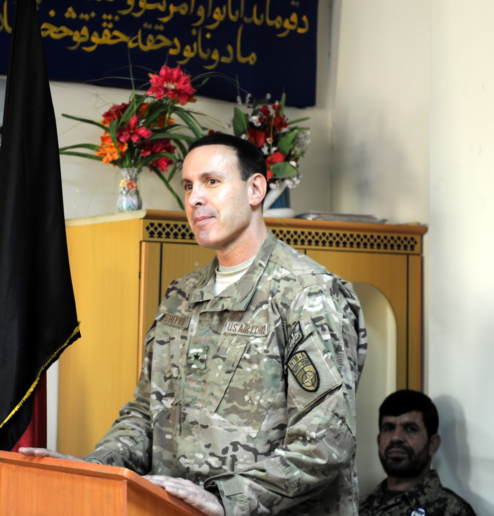 U.S. Air Force Brig. Gen. Steven Shepro, 438th Air Expeditionary Wing commander, gives congratulatory remarks during an Mi-17 helicopter ‘Engine & Body’ class graduation that took place Dec. 20, 2012 at Kabul, Afghanistan, International Airport. Sixteen students graduated after successfully completing 250 hours of training on avionics, engine and aircraft body work. (U.S. Air Force photo/Staff Sgt. Mekpongsatorn)