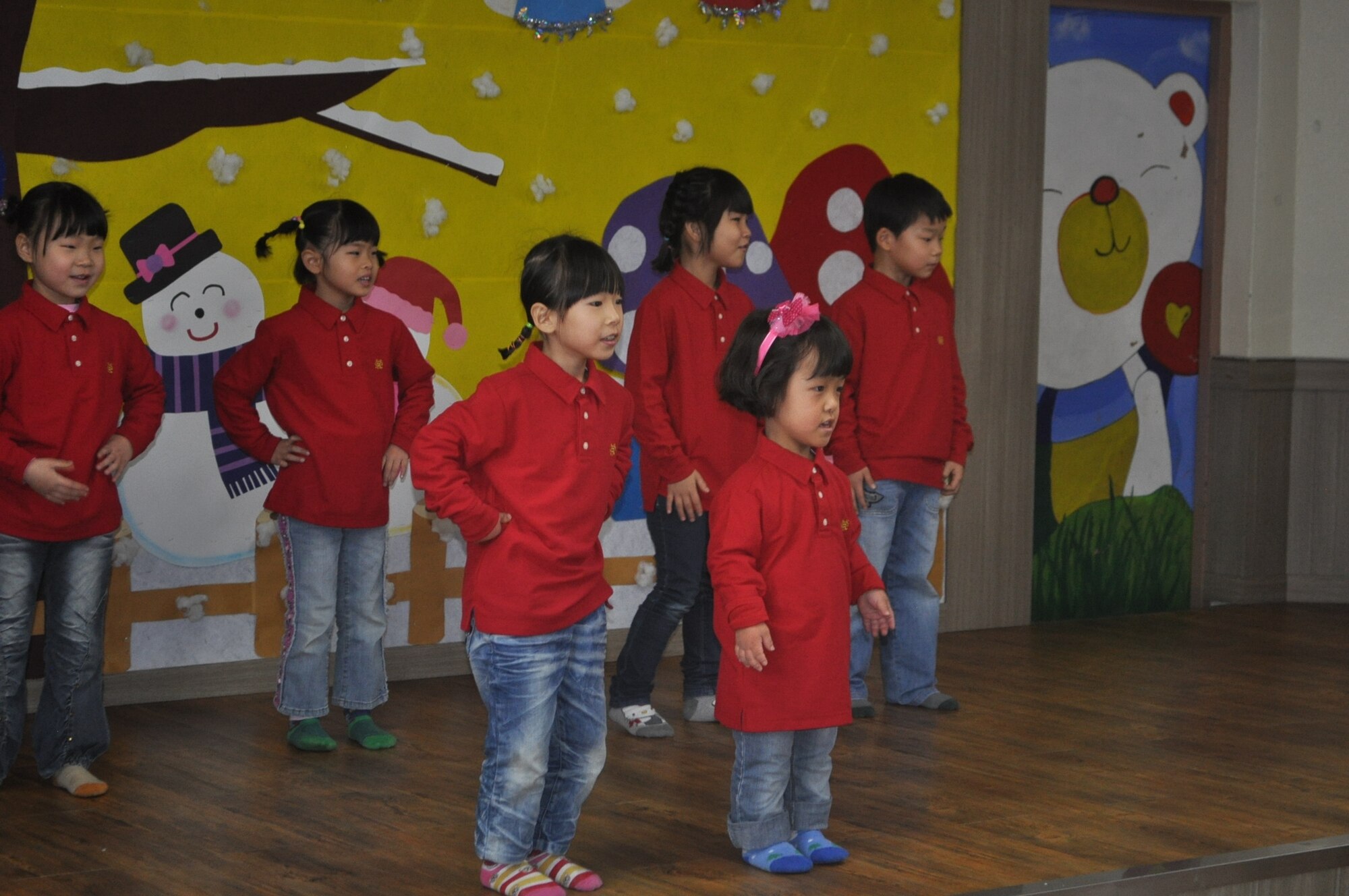 Children of Ae Hyang performed a medley of popular Christmas carols in both English and Korean for members of the 36th Fighter Squadron during a visit to the orphanage in Pyeongtaek Dec. 15, 2012. The more than 75 members of the 36th FS delivered Christmas cheer in the form of gifts and homemade traditional American sweets. (courtesy photo)