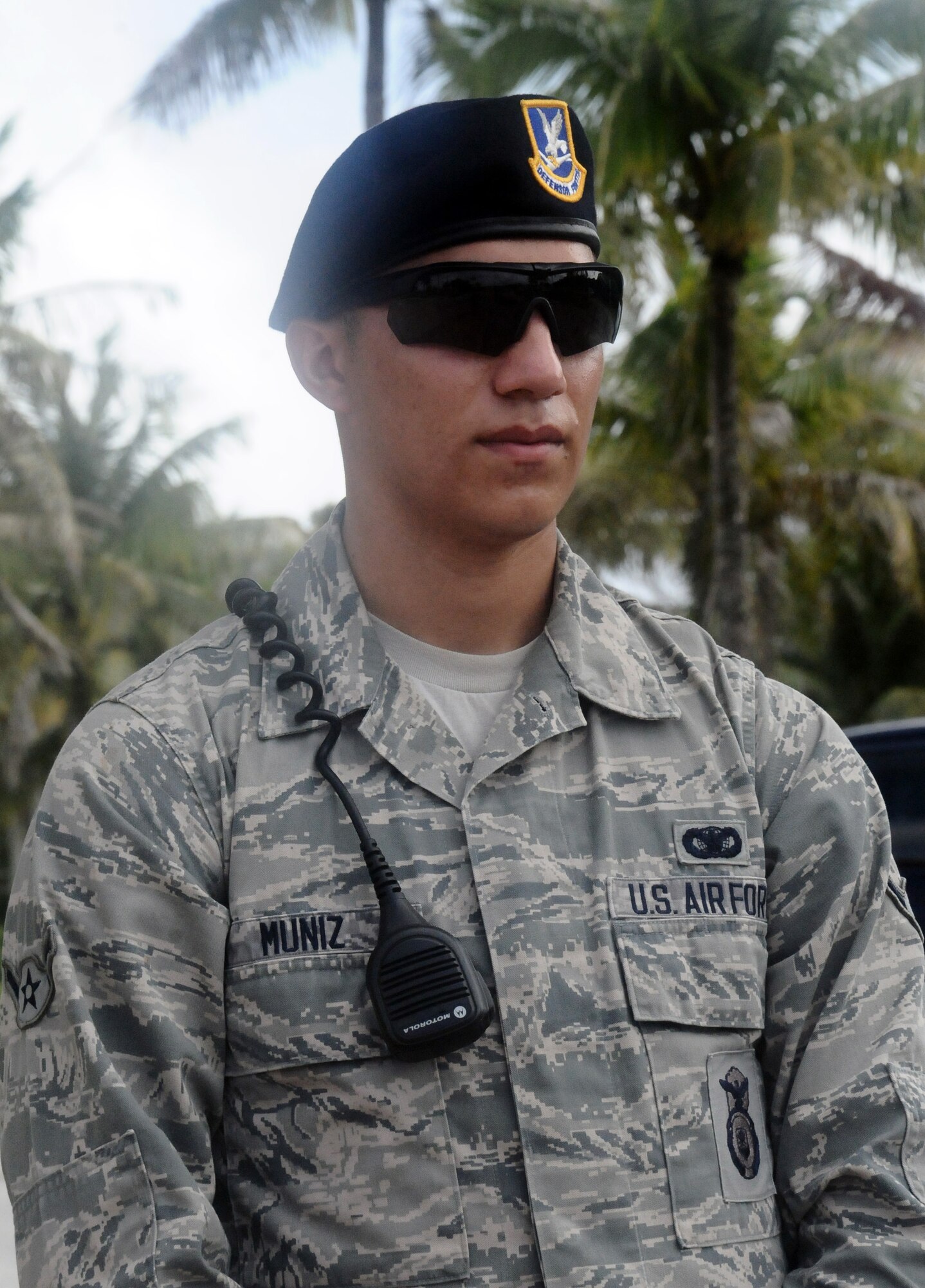 Airman Alan Muniz, a dedicated gate guard from the 36th Security Forces Squadron, stands watch at the main gate at Andersen Air Force Base, Guam, Jan. 2, 2013. The purpose of the dedicated gate guard section is to reflect the highest standards of military bearing and the profession of arms while ensuring access to Andersen is given only to those with proper credentials. ( U.S. Air Force photo by Airman 1st Class Mariah Haddenham/Released)