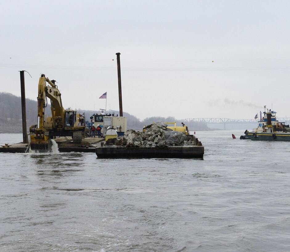 The removal of 890 cubic yards of limestone from the navigation channel on the Mississippi River near Thebes, Ill., began Dec. 17, 2012. This is just one phase of the action the Corps is taking to improve the navigation channel for the river industry.