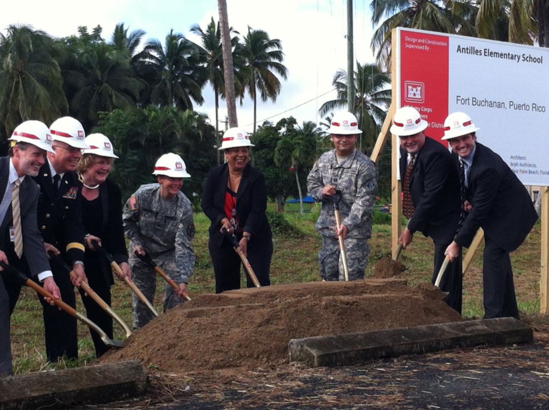 Shovels hit the ground, signifying the beginning of construction for a state-of-the art elementary school at Fort Buchanan, Puerto Rico. The school is one of the first Department of Defense Education Activity (DoDEA) schools that will incorporate 21st century school design elements. Pictured (l to r): Michael Gould, DoDEA school superintendent; Maj. Gen. Antonio J. Vicens, Adjuntant General of the Puerto Rico National Guard; Dr. Elizabeth Middlemiss, DoDEA headquarters; Col. Susan Heard , Fort Buchanan commander; Lydia Blazquez, Antilles Elementary School principal; Capt. J.C. Cordon, deputy district engineer for the Antilles; Yamil Castillo, chief, Antilles Construction Office; and William Gilbane III, Gilbane Company.  