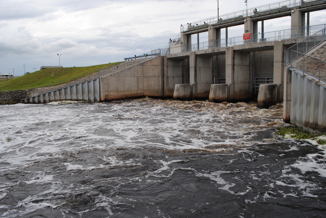 Water flows through the gates of the Moore Haven Lock in October, as Jacksonville District started discharges from Lake Okeechobee to stem the rapid rise in lake levels after Tropical Storm Isaac.  The releases began Sept. 19 and continued until early November.