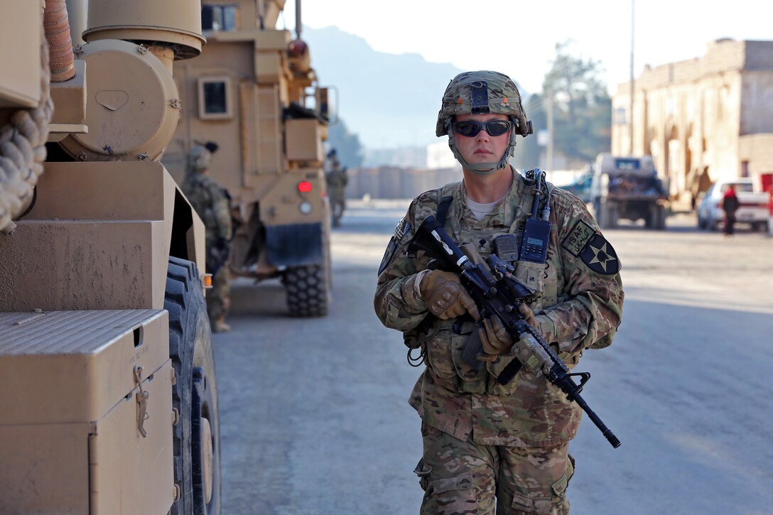 U.S. Army Spc. Michael Jones Checks Security After Arriving Outside The ...